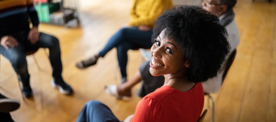 A young woman at a support group meeting