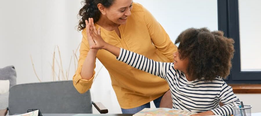 Adult and child working together at a table