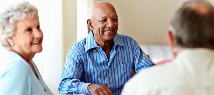 Older adults socializing and talking together